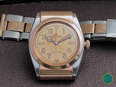 Rolex 3065 Hooded Bubbleback (1944) – Steel & Rose Gold | Rare “Pink Error Proof” Dial