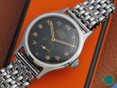 Rare black gilt dial  Doxa 565 calatrava with 35mm steel 565 Borgel (FB) case